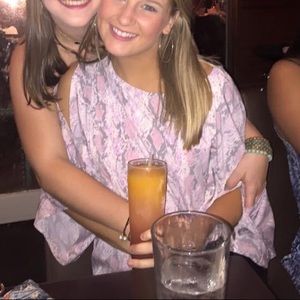 Snakeskin blouse with open shoulders